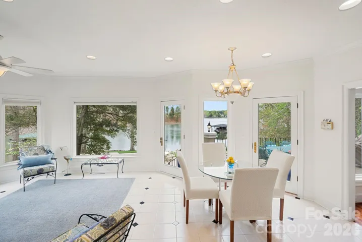 Keeping room + picture windows gives peaceful waterfront living 