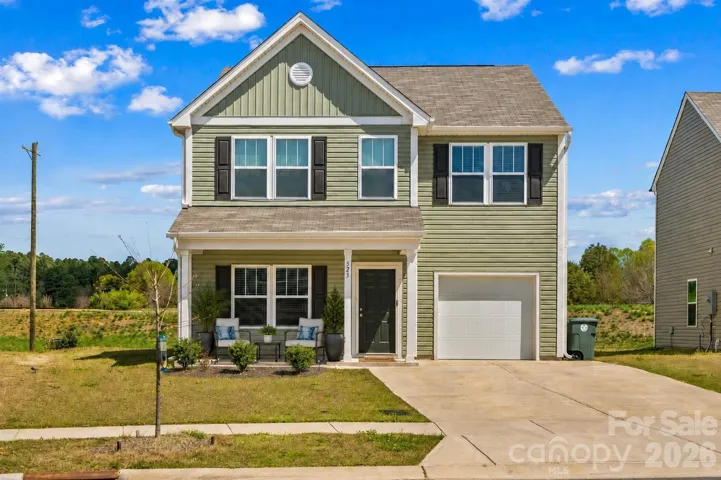 Extended Driveway (Virtually staged porch)