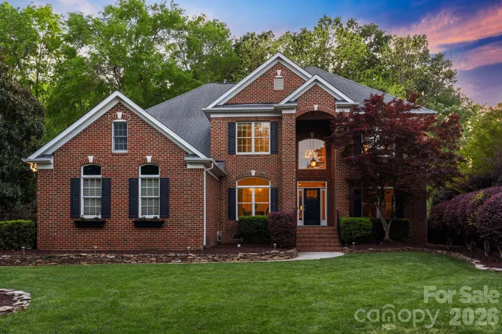 Welcome to 12644 Lahinch Court! Perched on a private cul-de-sac in beautiful Providence Country Club