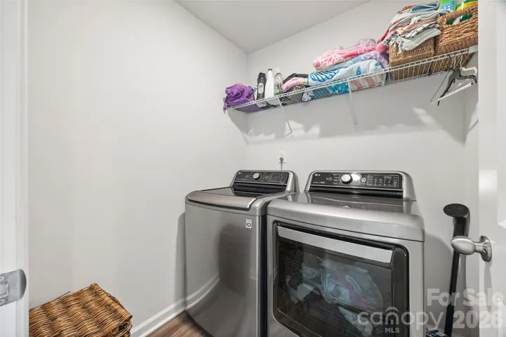 Walk-in laundry room upstairs