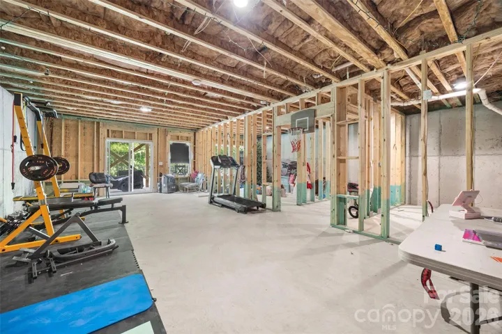 Full unfinished walk-out basement is completely wired and plumbed for a bathroom