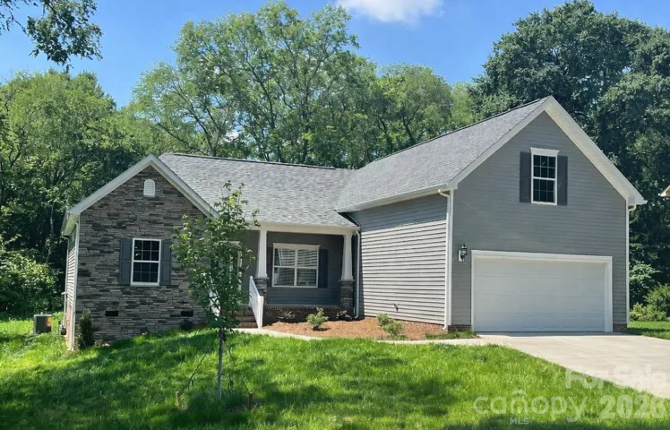 Beautiful 4 BR 3 1/2 BA Ranch on 1/2 Acre Private Home Site