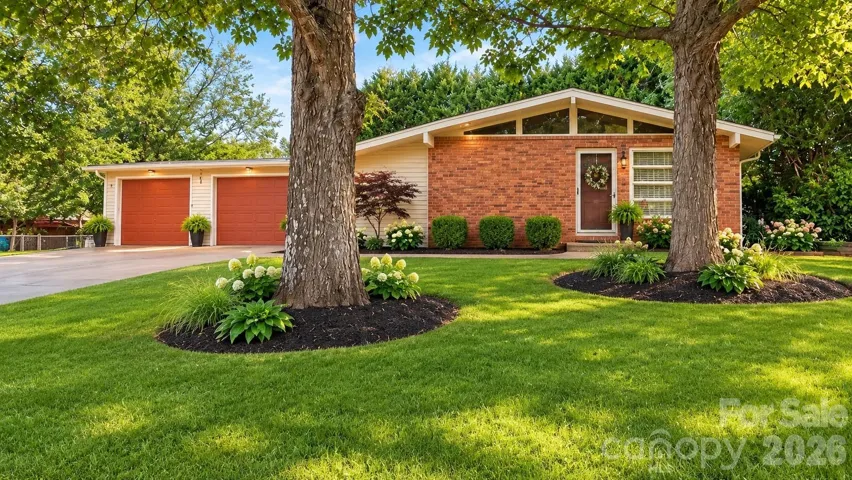 Front View (digitally altered to show landscaping options)