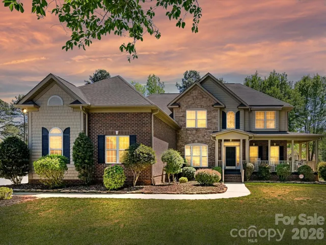 Twilight View of 5413 Hudson Road on 1.2 Acres