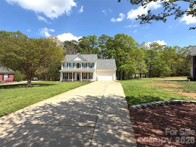 Cul-de-sac lot with long driveway on .53 acre.