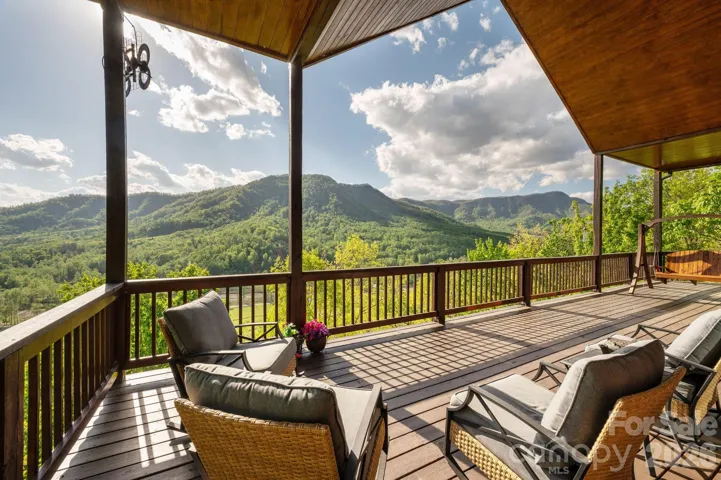 3 huge covered front porches to enjoy every season that passes by offering breathtaking long range mountain views.