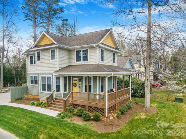 Corner lot, lush yard, covered sitting porch