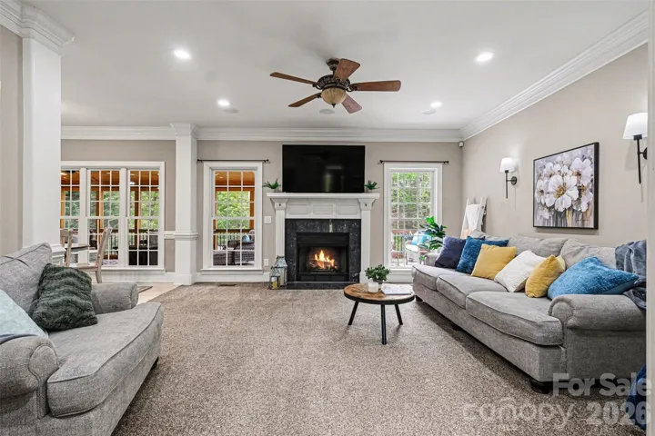 Family room with fireplace and built-in cabinets
