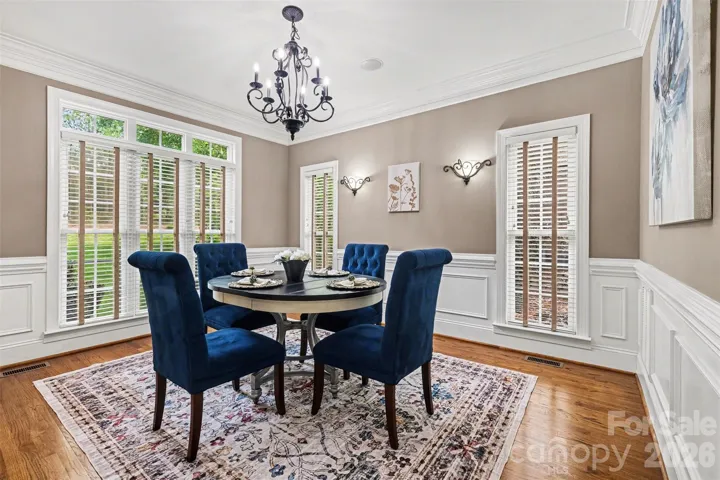 Formal dining room with lots of windows