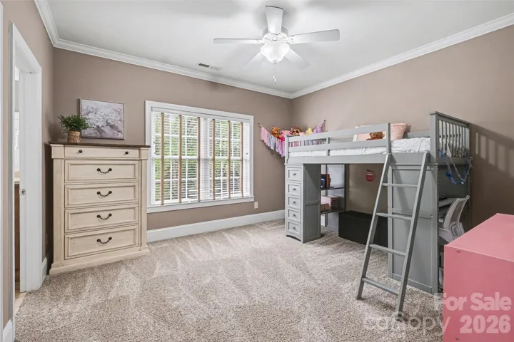 Secondary bedroom three with private full bathroom