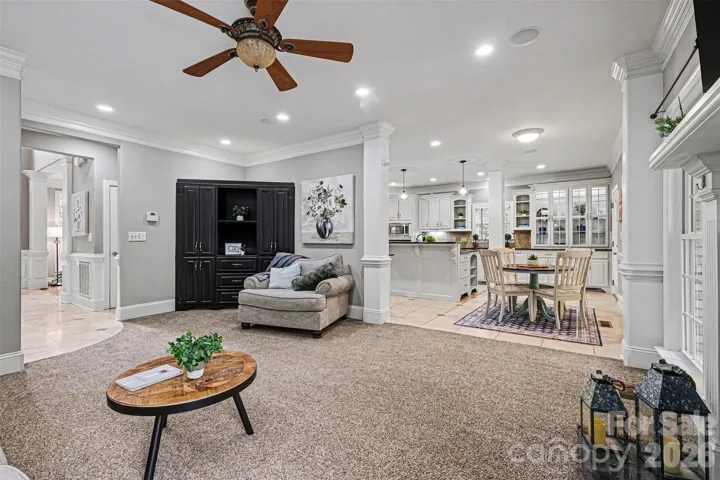 Family room with fireplace and built-in cabinets