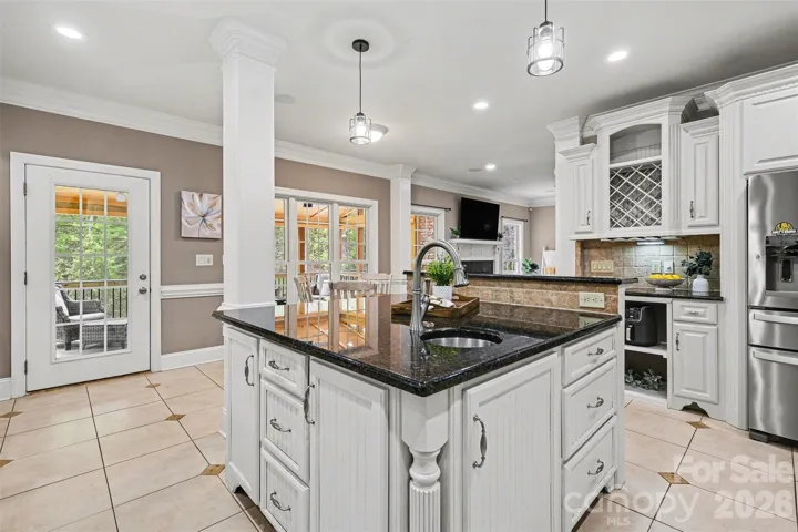 Spacious kitchen with island and dining area