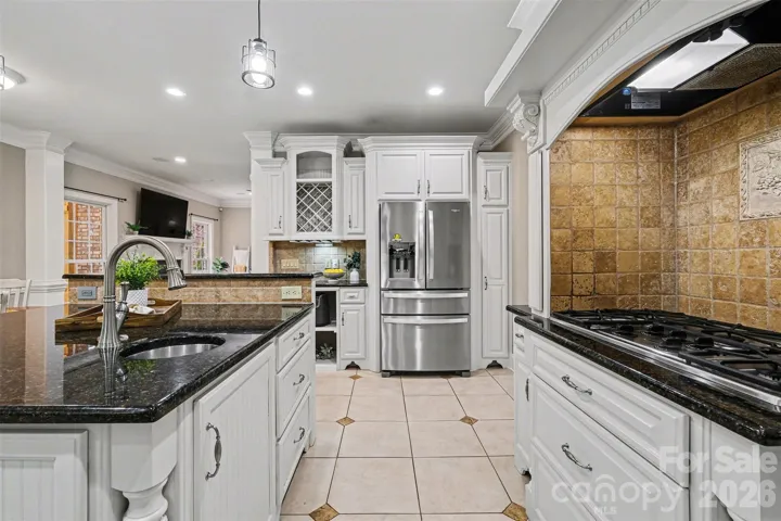 Spacious kitchen with island and dining area