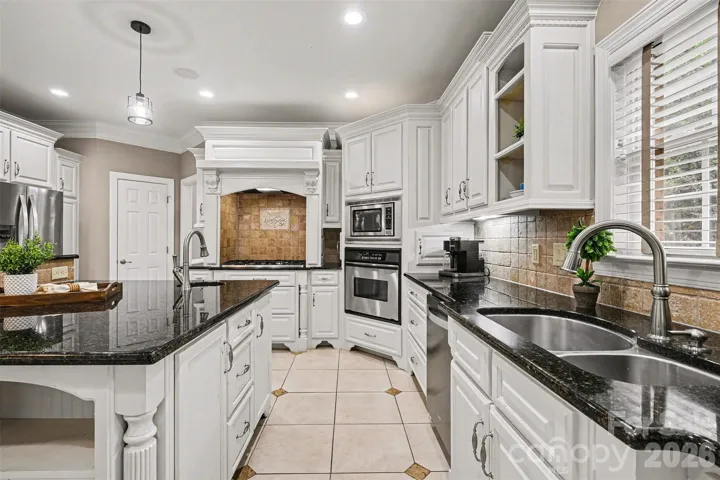 Spacious kitchen with island and dining area
