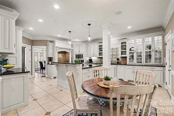 Spacious kitchen with island and dining area
