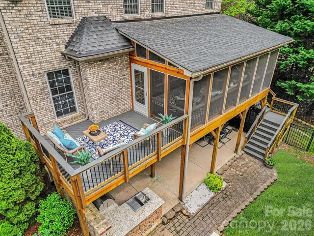Aerial view of main level deck and screened porch