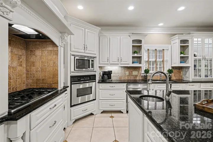 Spacious kitchen with island and dining area
