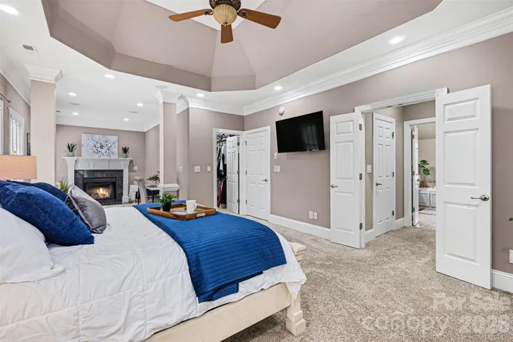 Large Primary suite with sitting area and fireplace