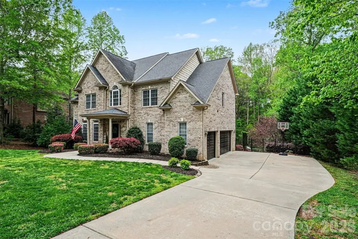 Full brick custom home with 3-car garage and basement