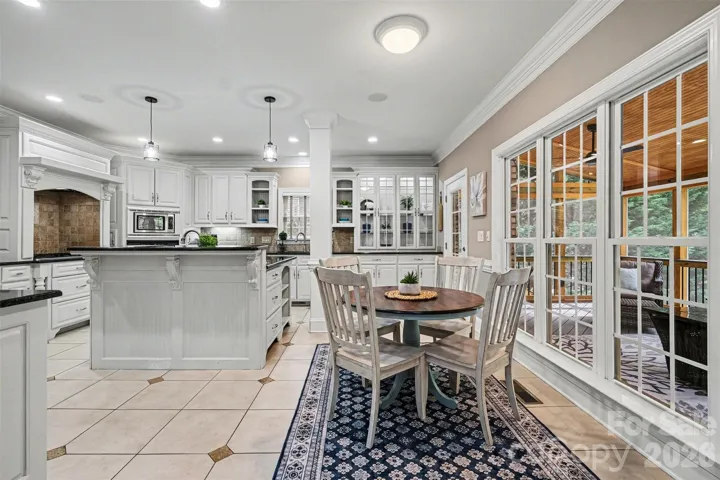 Spacious kitchen with island and dining area