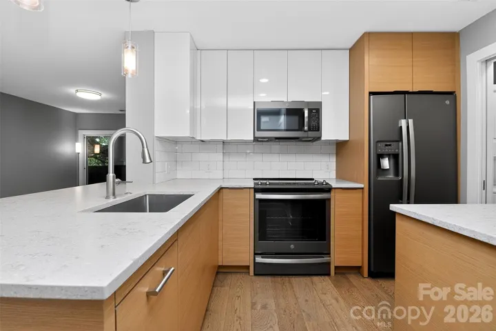 To-the-studs designer's dream renovation in 2021, welcome home to 603 Queens Rd. #B!