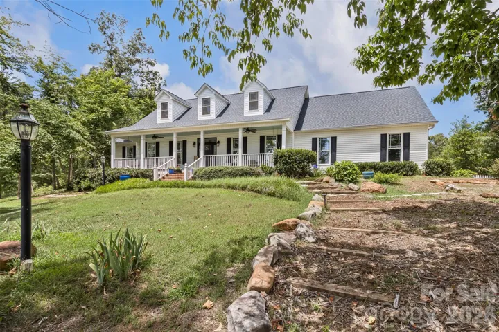 The main house at 378 Collinsville is the perfect blend of farmhouse and mountain estate.