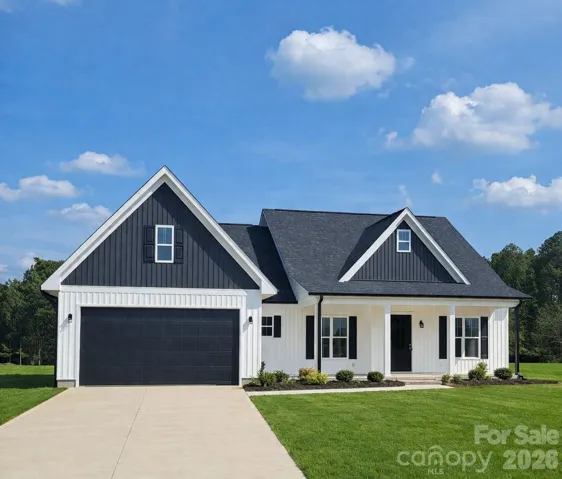 Front of the house, grass is edited