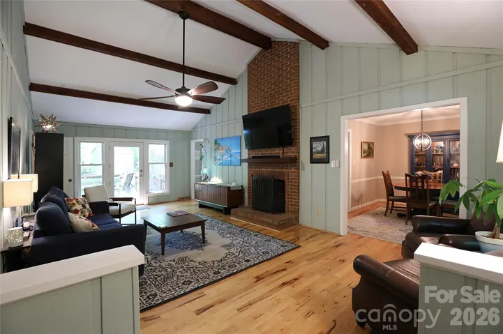 Glass door leads to the Deck and Backyard!  