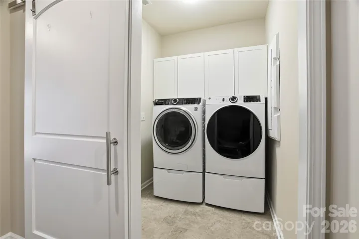 Laundry room with barn door