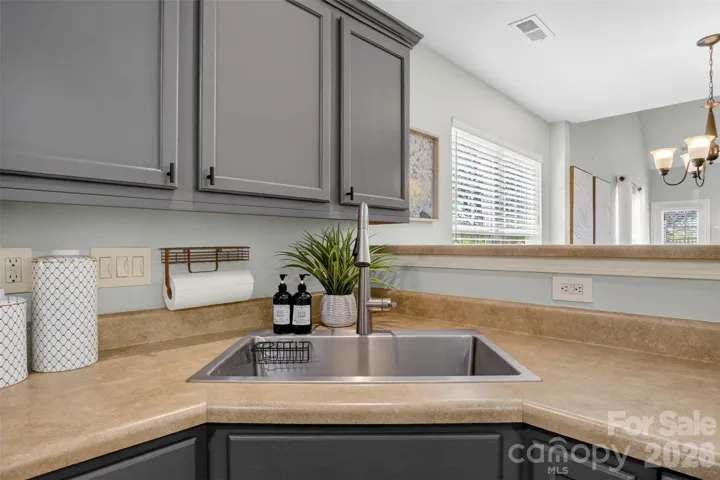 Large basin sink with gooseneck faucet