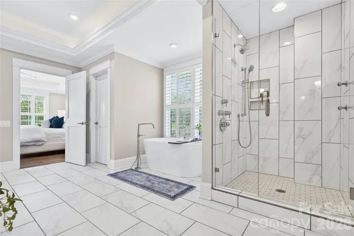 Glass-Enclosed Shower With Dual Shower Heads