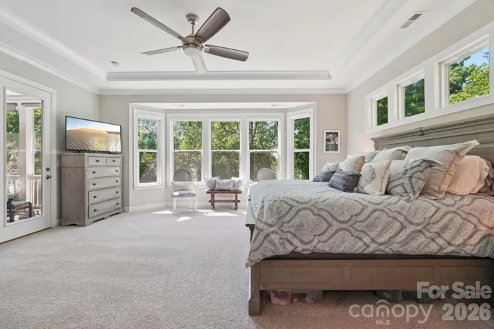 Large windows with views, and door to the patio
