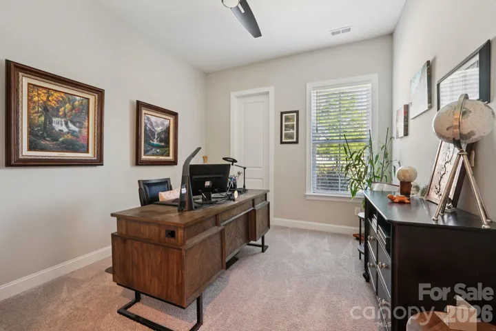 Dedicated office with double glass door and closet