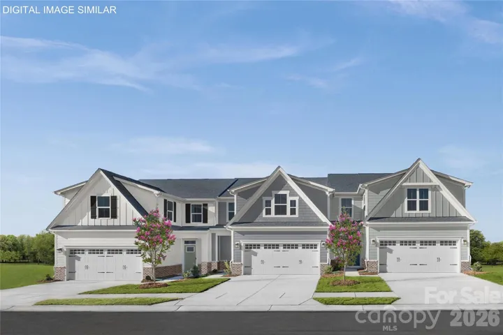 Caroline plan with true main-level living—first-floor primary suite and laundry for everyday ease.