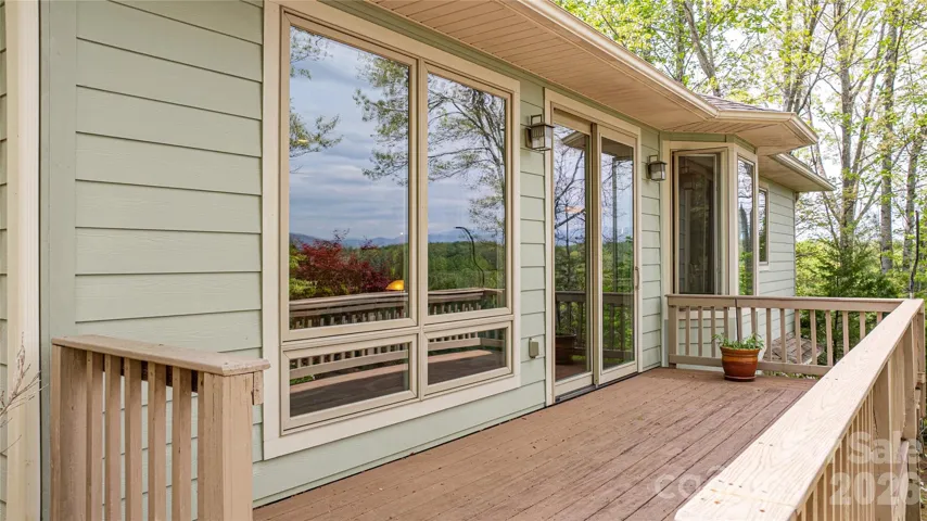 Rear deck w/ beautiful long range views or lake and mountains