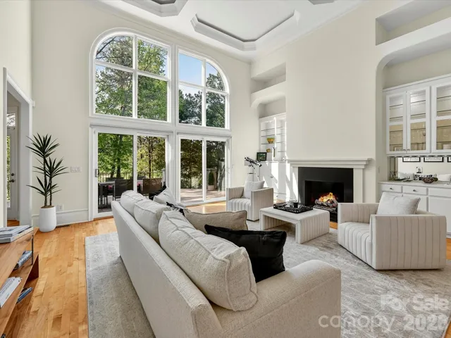 Family room with floor to ceiling windows