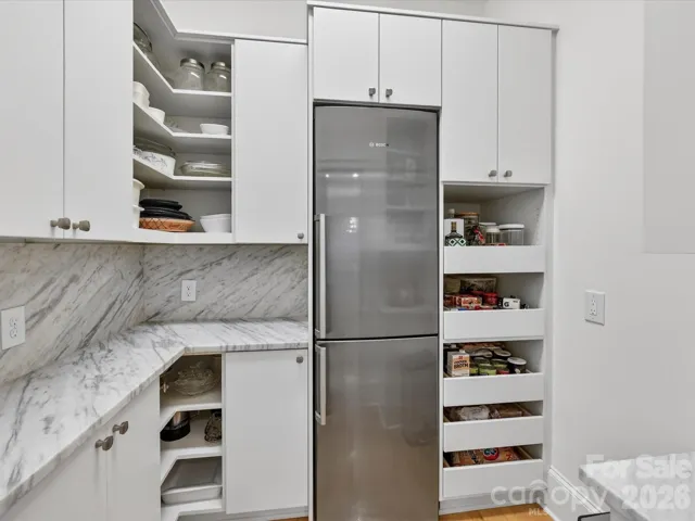 newly designed walk-in pantry with fridge