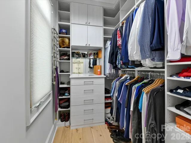 Stunning custom built separate closets