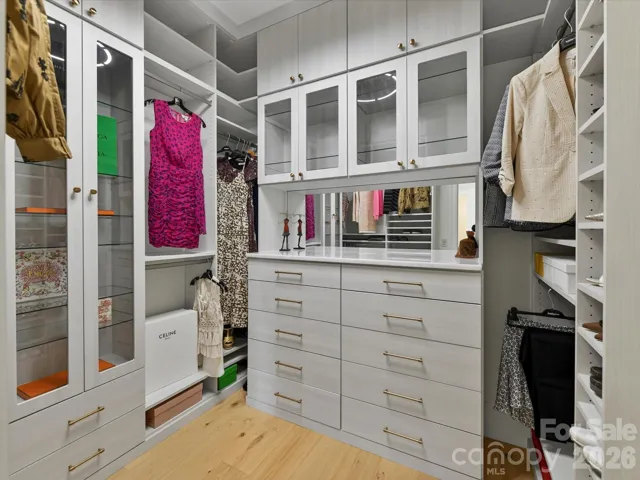 Stunning custom built separate closets