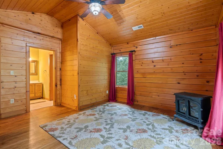 Spacious layout with natural light and direct access to an en-suite bath for added convenience.