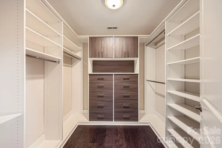 Custom Primary closet by Closets by Design