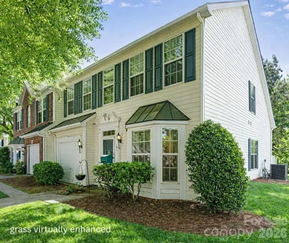 Welcome home! End unit with garage and driveway parking.
