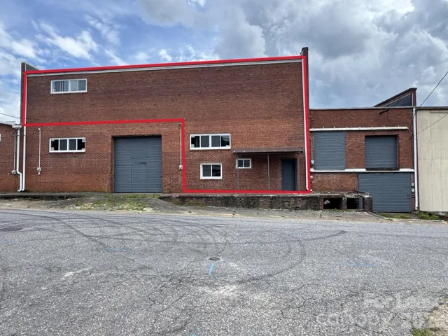 Front with outline of space for lease in red
