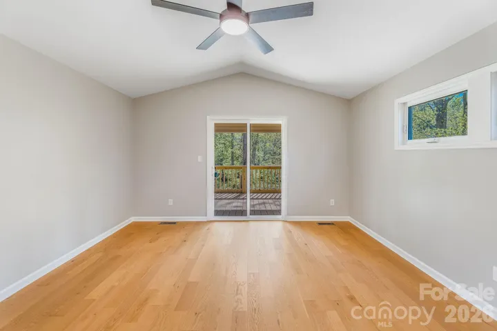 primary bedroom with private deck 
