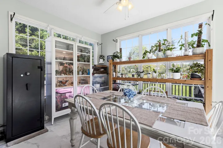 Sunroom with large windows for natural light