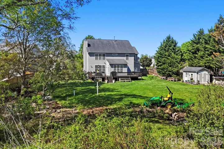Fenced in back yard. Plenty of room for gardening or kids to play