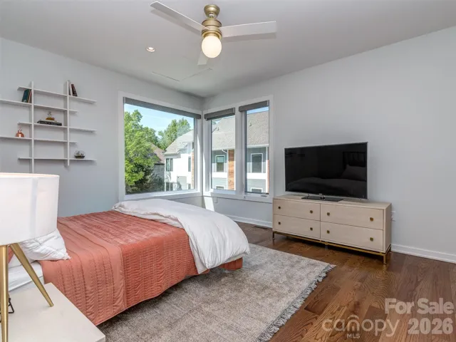 Huge Guest Suite with Hardwood Floors, Tons of Natural Light, and Automatic Black Out Blinds.