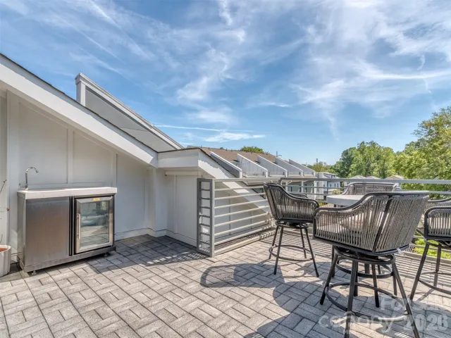End Unit Rooftop Terrace Overlooking Chantilly on the Green with Spectacular Views Both Day and Night!