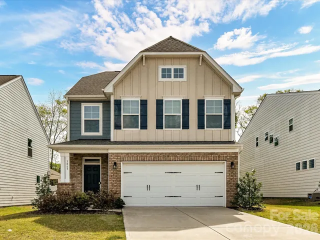 Charming two-story home featuring a welcoming covered entry, attractive curb appeal, and a spacious two-car garage in a desirable neighborhood.