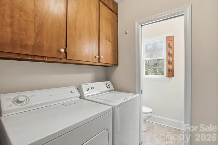 Laundry room with storage cabinets